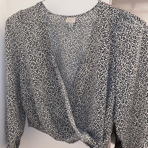 “ A new day” wrap printed top.